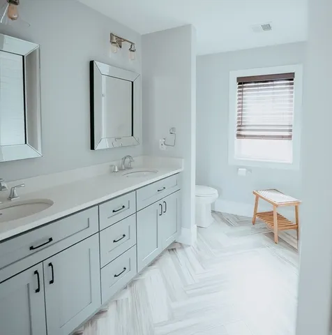 a utility room with washer and dryer