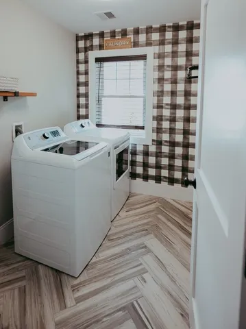 a bedroom with a bed and a book shelf