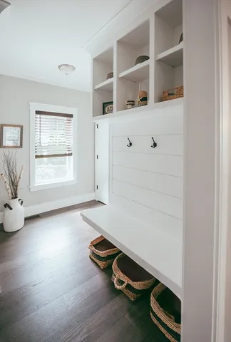 a room with chair and window