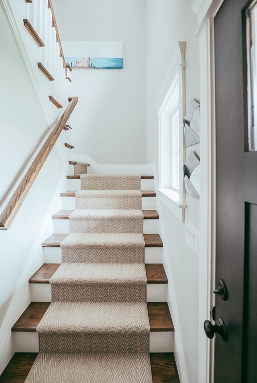 1 Proctor Street Natick, MA 01760 - Photo 4 of 23 a view of staircase with white walls