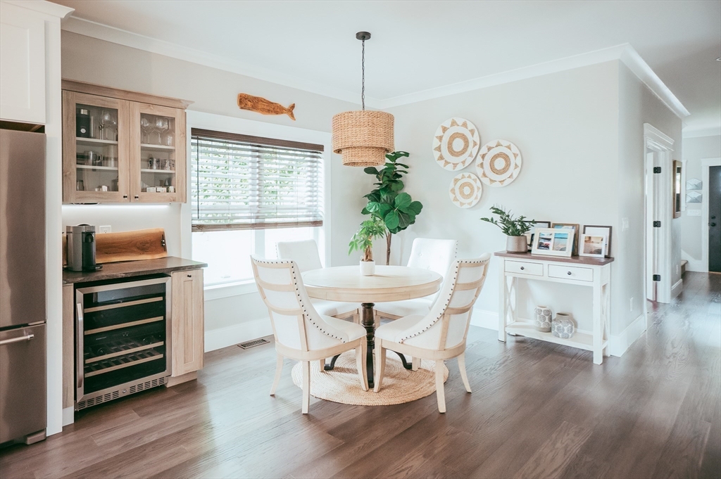 1 Proctor Street Natick, MA 01760 - Photo 9 of 23 a view of a dining room with furniture window and wooden floor