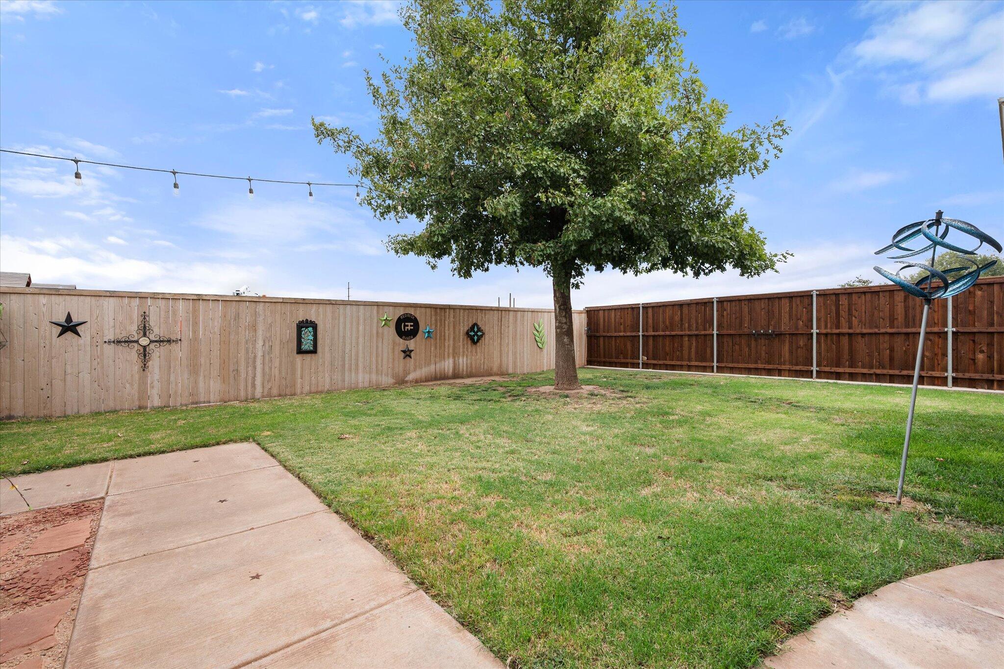 5908 110th Street Lubbock, TX 79424 - Photo 29 of 31 a view of backyard with garden