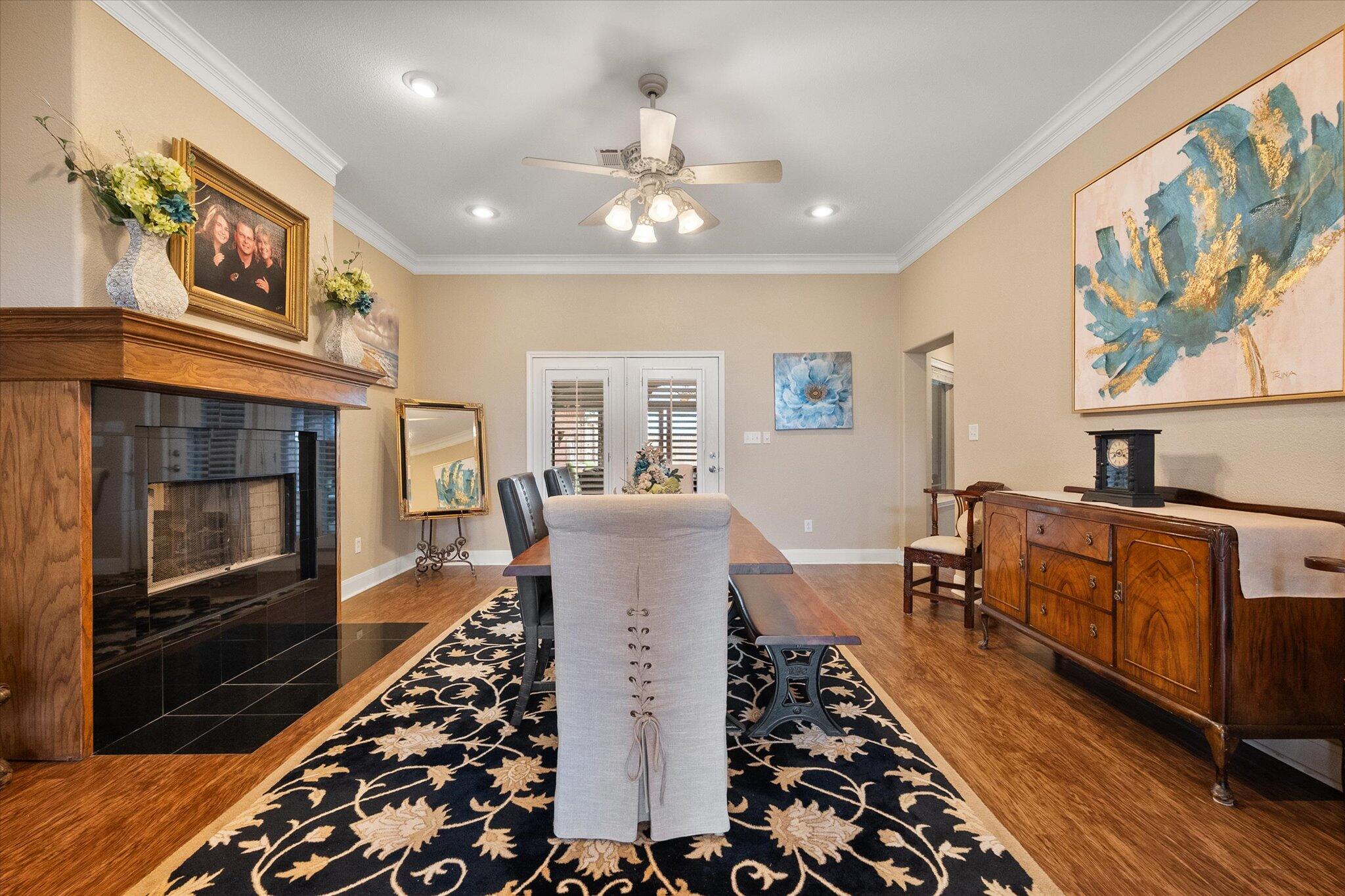 5908 110th Street Lubbock, TX 79424 - Photo 5 of 31 a living room with furniture and a fireplace