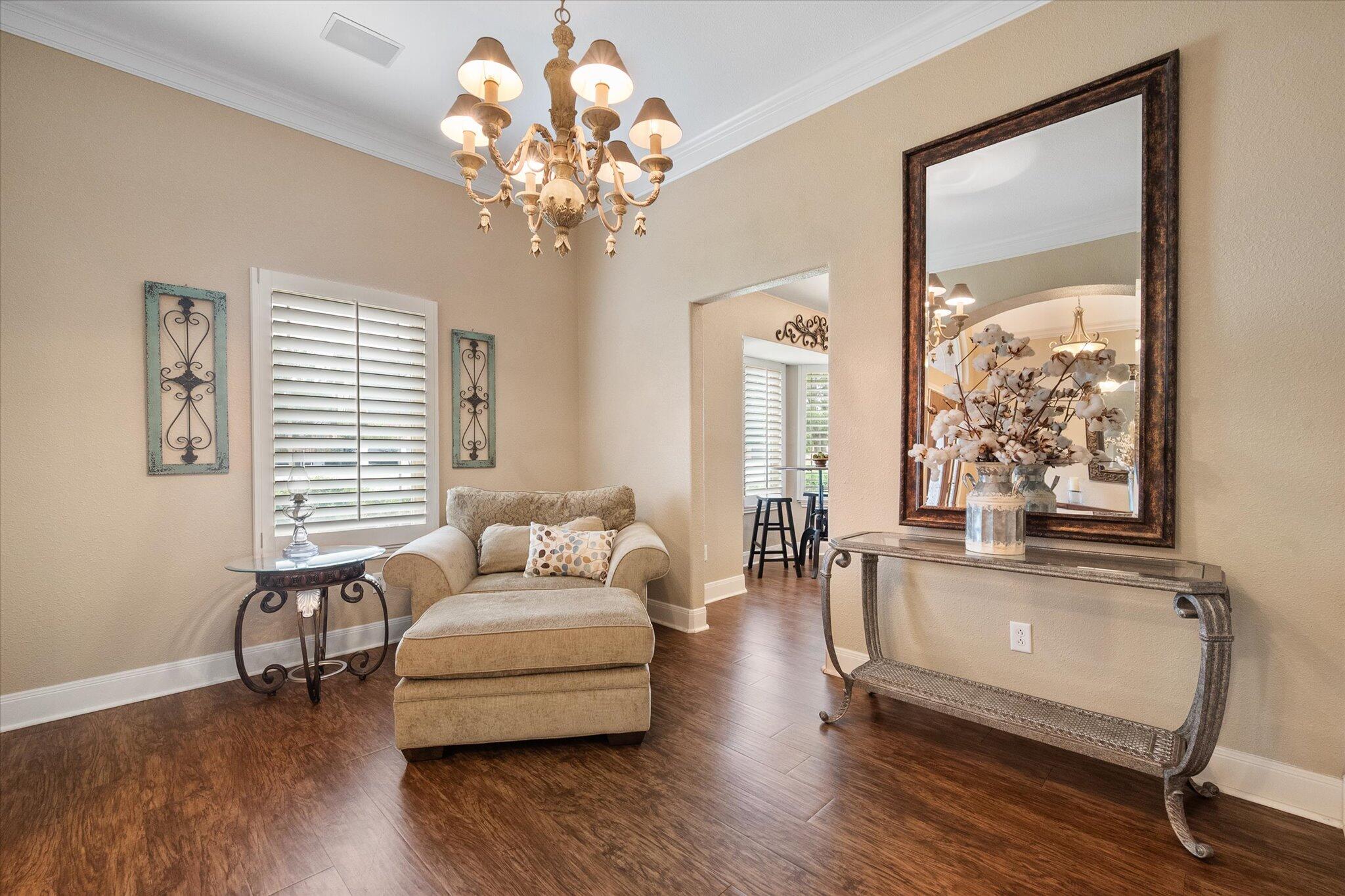 5908 110th Street Lubbock, TX 79424 - Photo 7 of 31 a living room with furniture and a large window