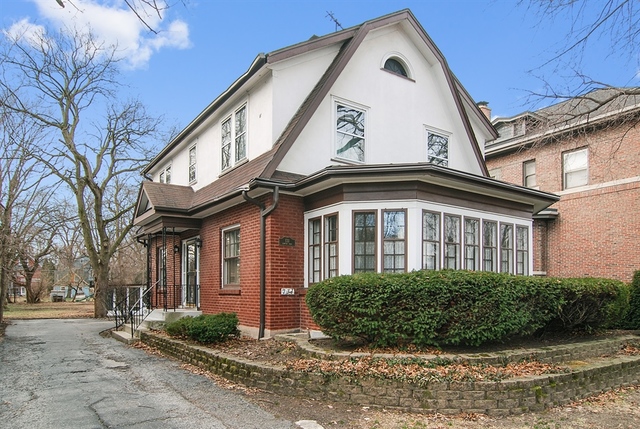 131 Lawton Road Riverside, IL 60546 - Photo 1 of 16 a front view of a house