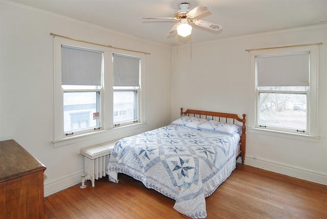131 Lawton Road Riverside, IL 60546 - Photo 11 of 16 a bedroom with a bed and a window