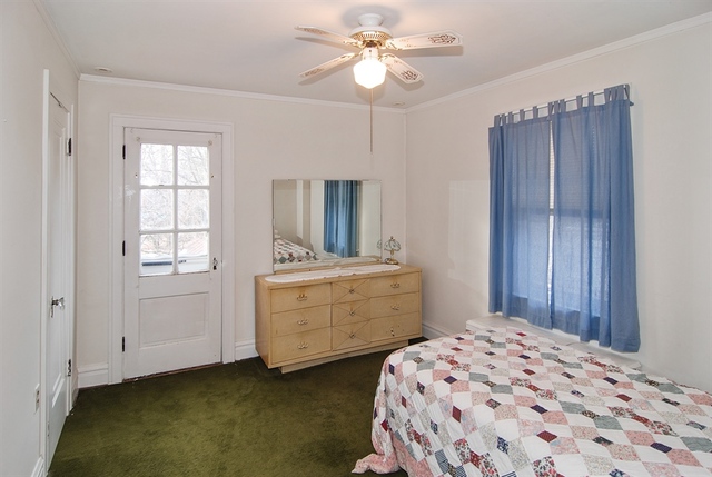 131 Lawton Road Riverside, IL 60546 - Photo 12 of 16 a bedroom with a bed and a dresser