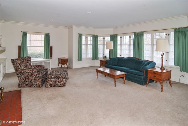 131 Lawton Road Riverside, IL 60546 - Photo 3 of 16 a living room with furniture and a large window