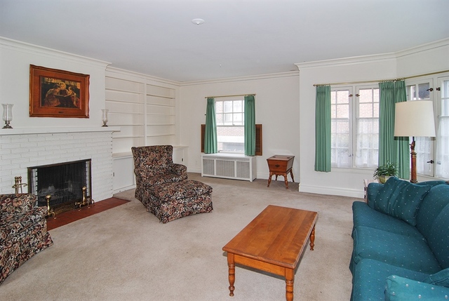 131 Lawton Road Riverside, IL 60546 - Photo 4 of 16 a living room with furniture and a fireplace