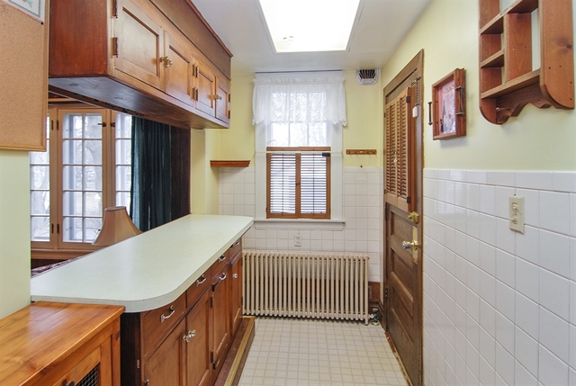 131 Lawton Road Riverside, IL 60546 - Photo 7 of 16 a view of a kitchen with a sink