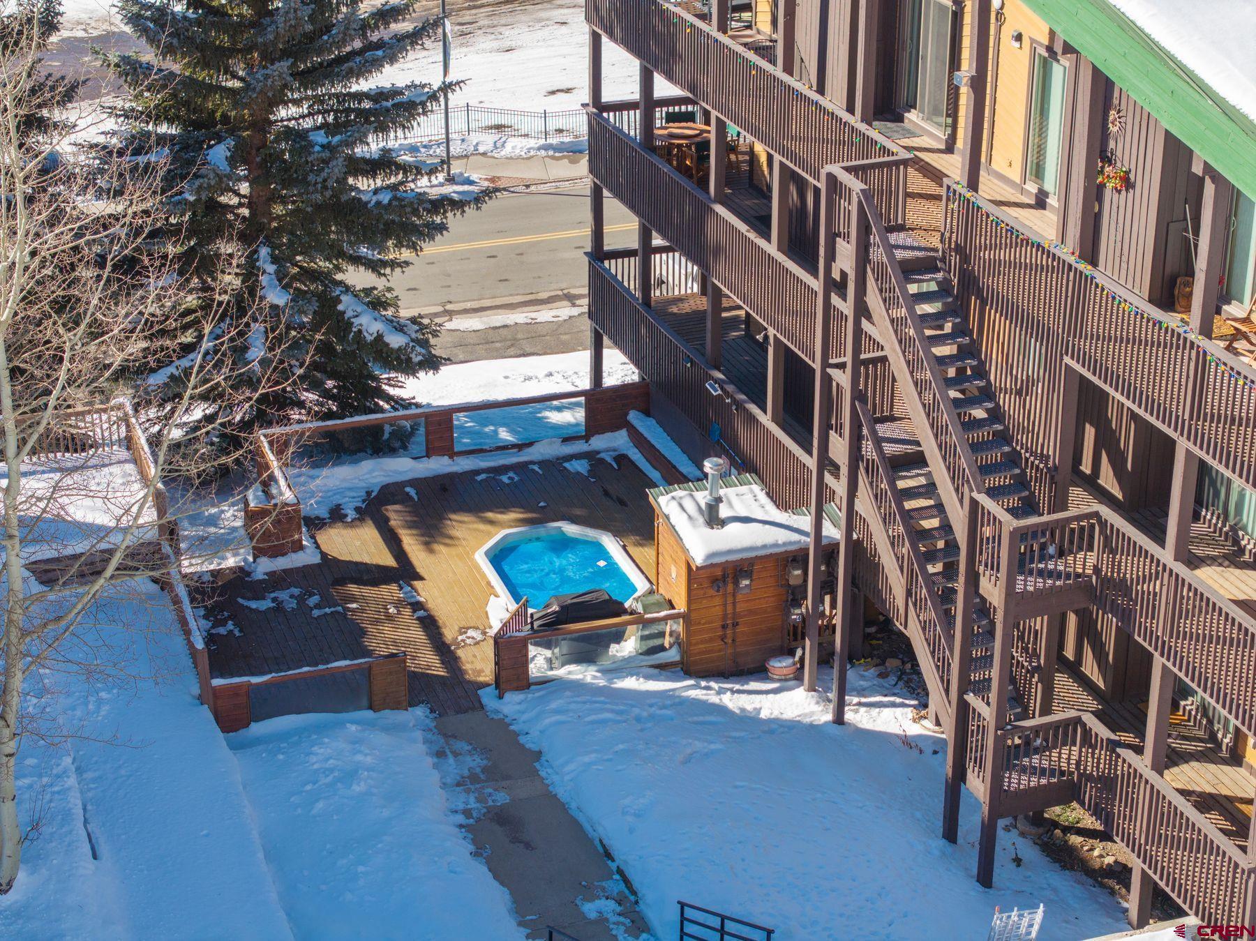 35 Emmons Road, Unit A Crested Butte, CO 81225 - Photo 5 of 28 One highlight of the robust on-site amenity package is the Evergreen hot tub.