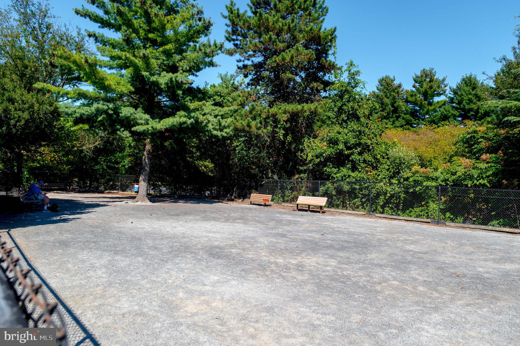 1443 Northgate Square, Unit 22B Reston, VA 20190 - Photo 34 of 42 a view of the roadside with trees