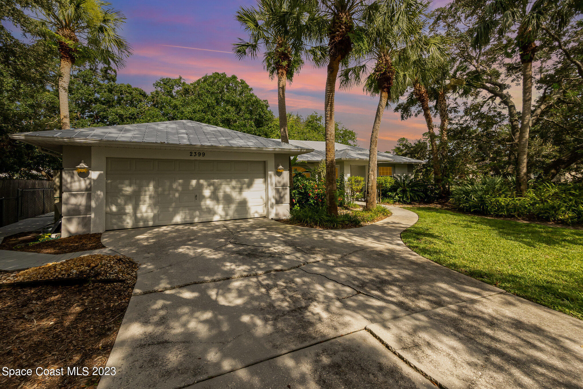 2399 Angel Road Palm Bay, FL 32909 - Photo 1 of 26 a view of a house with a yard