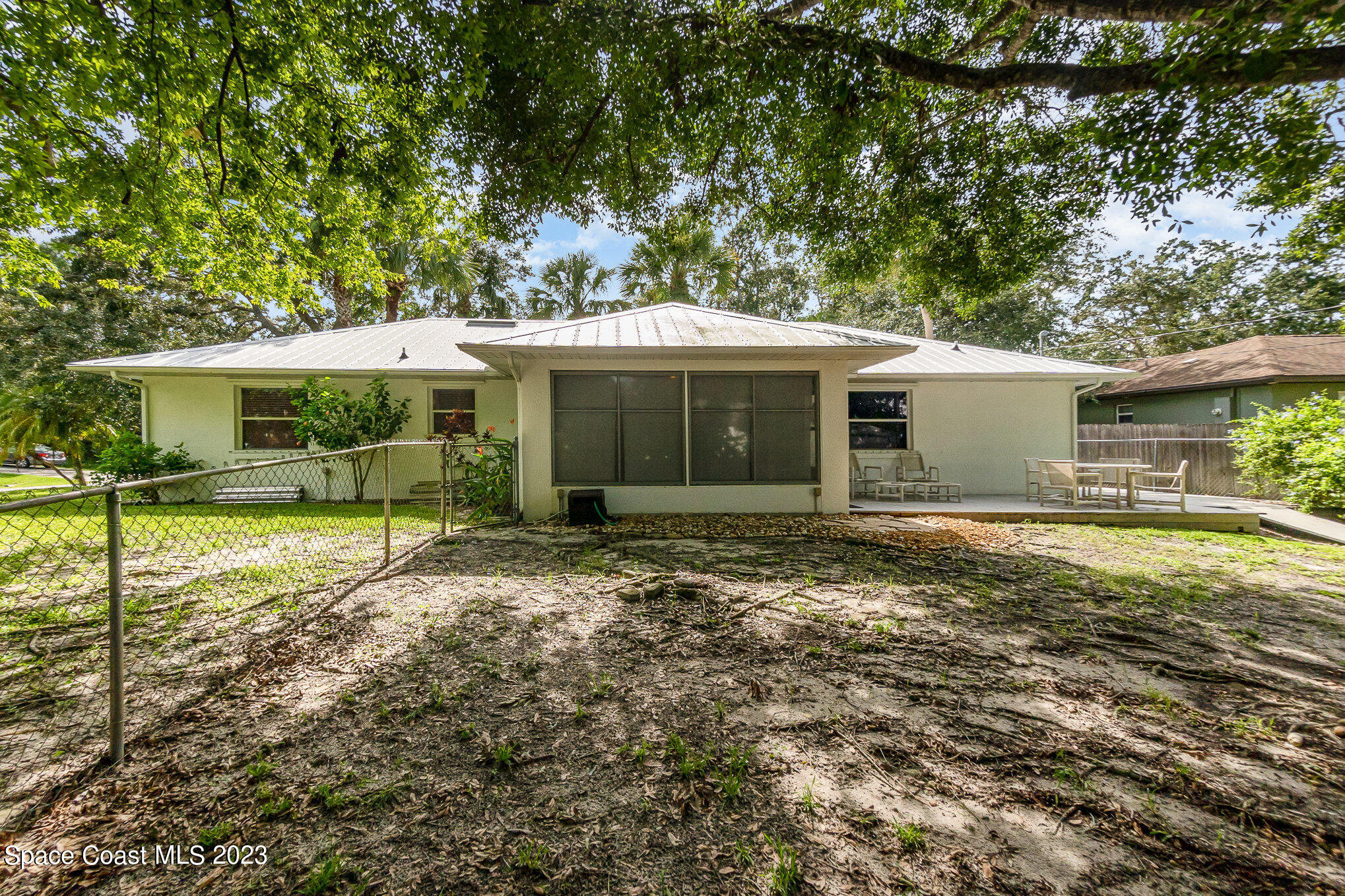 2399 Angel Road Palm Bay, FL 32909 - Photo 22 of 26 a view of a house with a yard