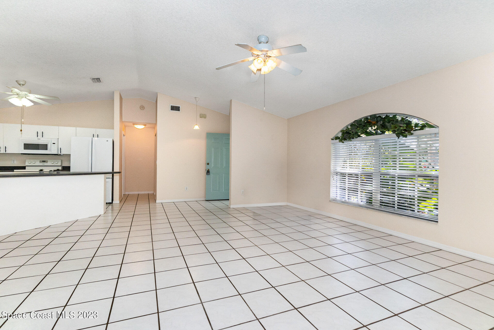 2399 Angel Road Palm Bay, FL 32909 - Photo 6 of 26 a view of an empty room and window
