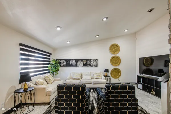 a kitchen with a sink and a stove top oven