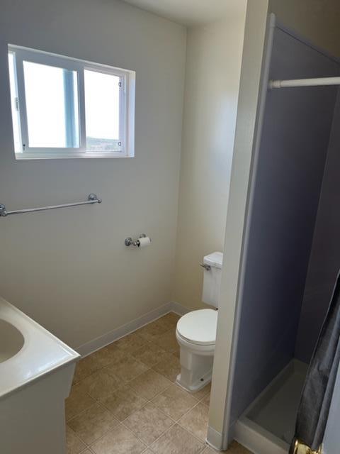 630 Manor Drive Pacifica, CA 94044 - Photo 13 of 17 a bathroom with a sink and a toilet