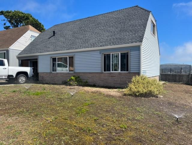 630 Manor Drive Pacifica, CA 94044 - Photo 2 of 17 a front view of a house with garden