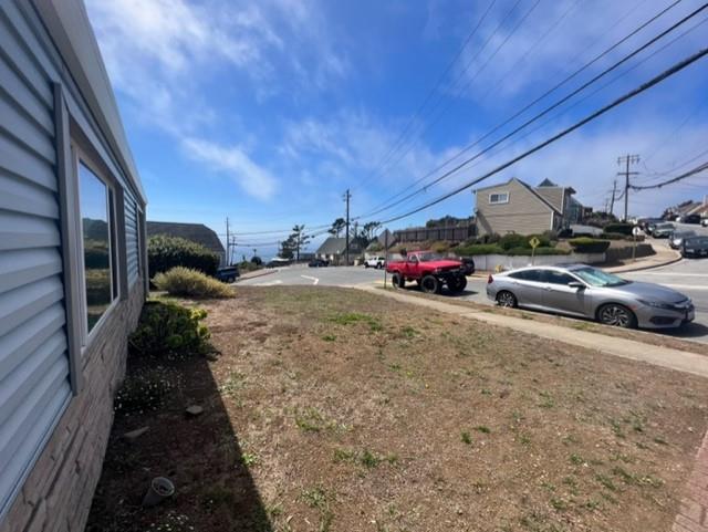 630 Manor Drive Pacifica, CA 94044 - Photo 3 of 17 a view of a car in front of a house