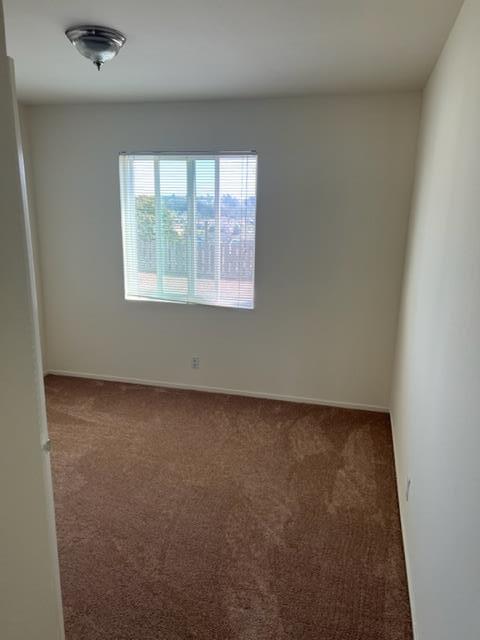 630 Manor Drive Pacifica, CA 94044 - Photo 7 of 17 an empty room with a window