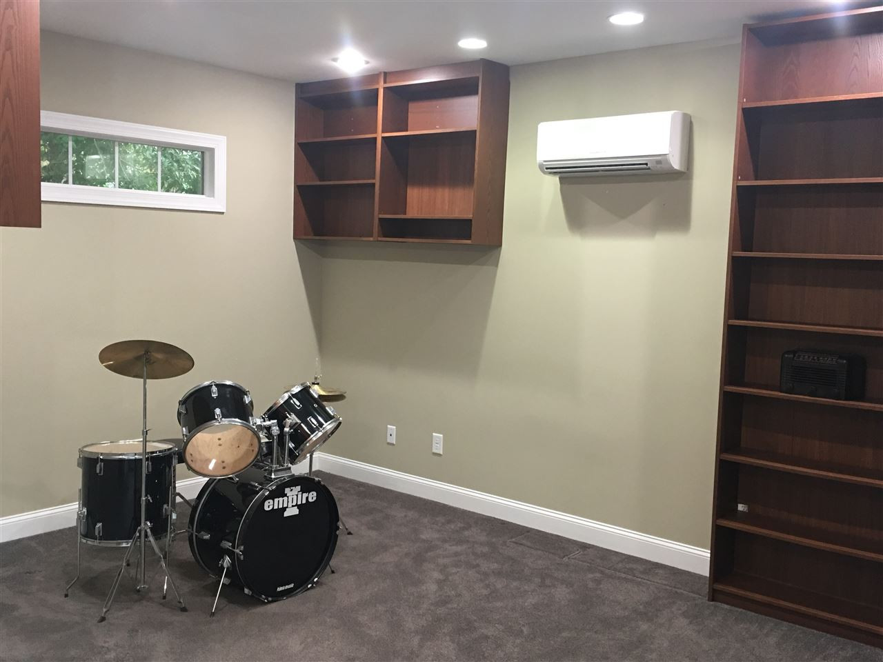 925 Pebblebrook Drive Raleigh, NC 27609 - Photo 16 of 23 Area Above Detached Garage, Lots of Shelves