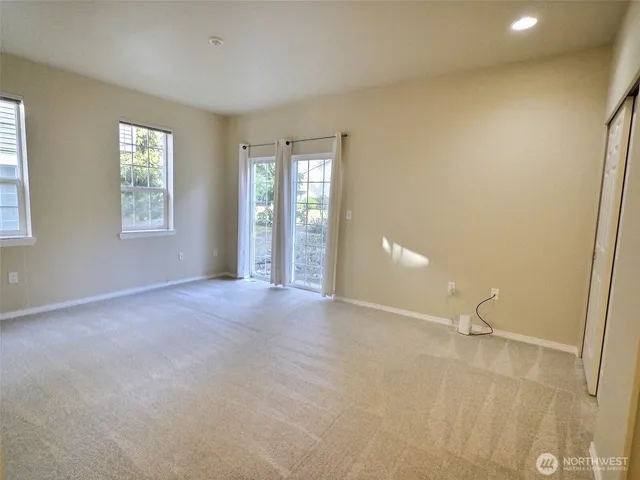 an empty room with windows