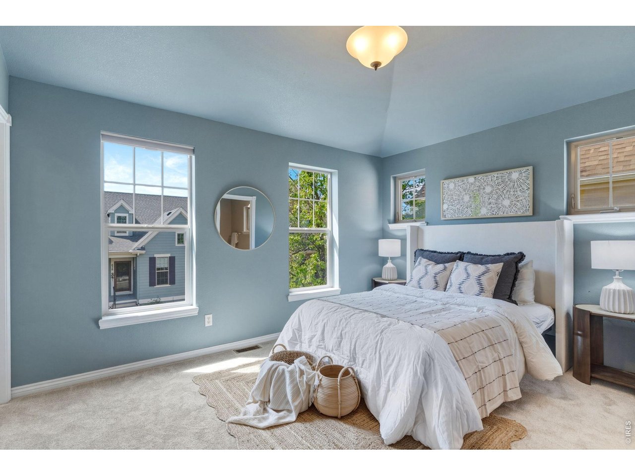 654 Homestead Street Lafayette, CO 80026 - Photo 14 of 31 a bedroom with a bed and a window