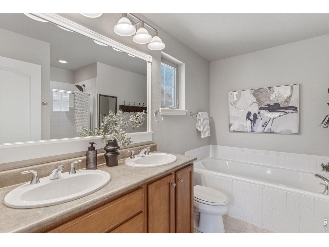 654 Homestead Street Lafayette, CO 80026 - Photo 16 of 31 Bathroom #2: 5-Piece Primary Bathroom with Soaking Tub