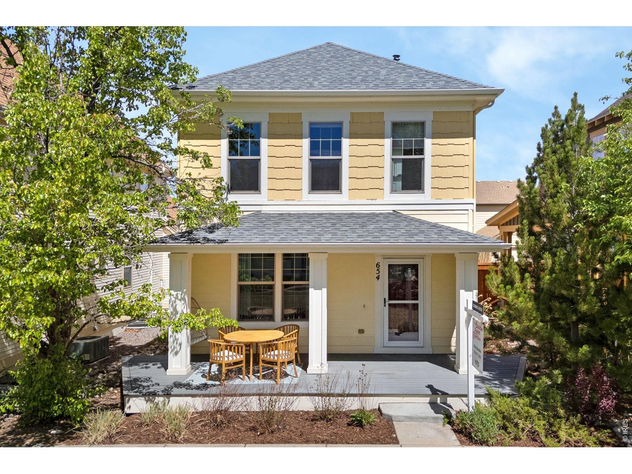 654 Homestead Street Lafayette, CO 80026 - Photo 2 of 31 a view of house with outdoor space and porch