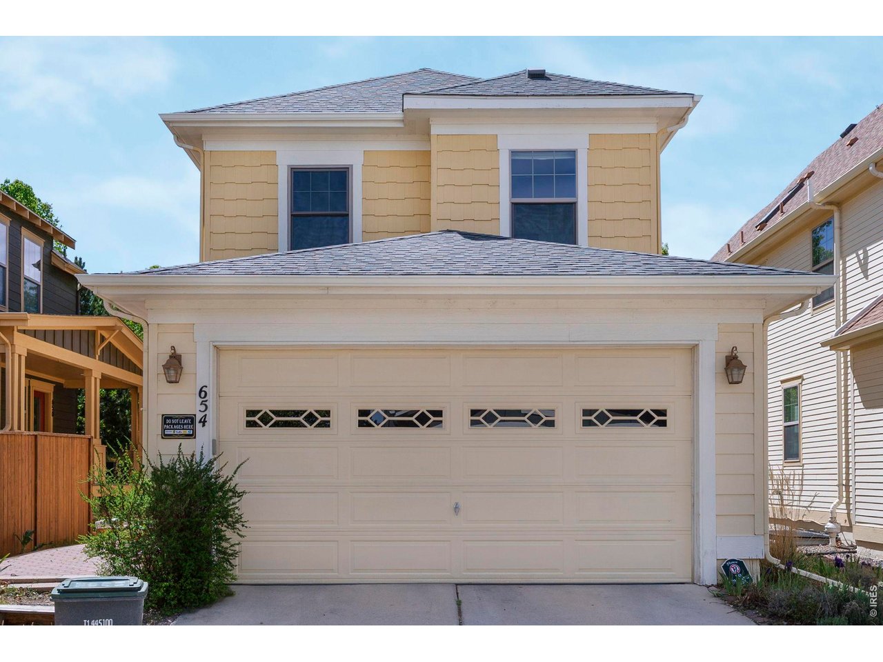 654 Homestead Street Lafayette, CO 80026 - Photo 27 of 31 2-Car Garage Entrance in Alley Behind Home