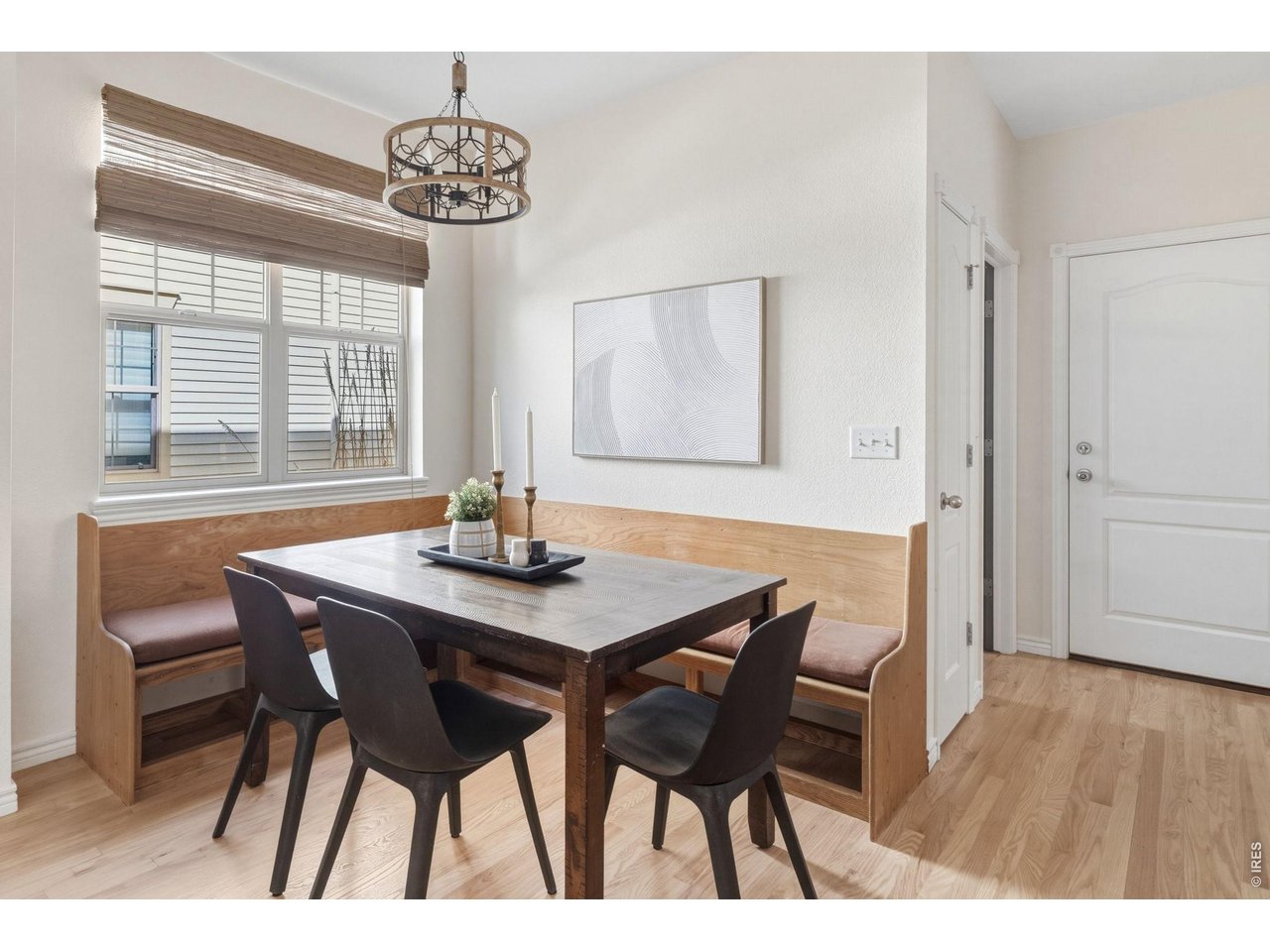 654 Homestead Street Lafayette, CO 80026 - Photo 8 of 31 a view of a dining room with furniture window and wooden floor