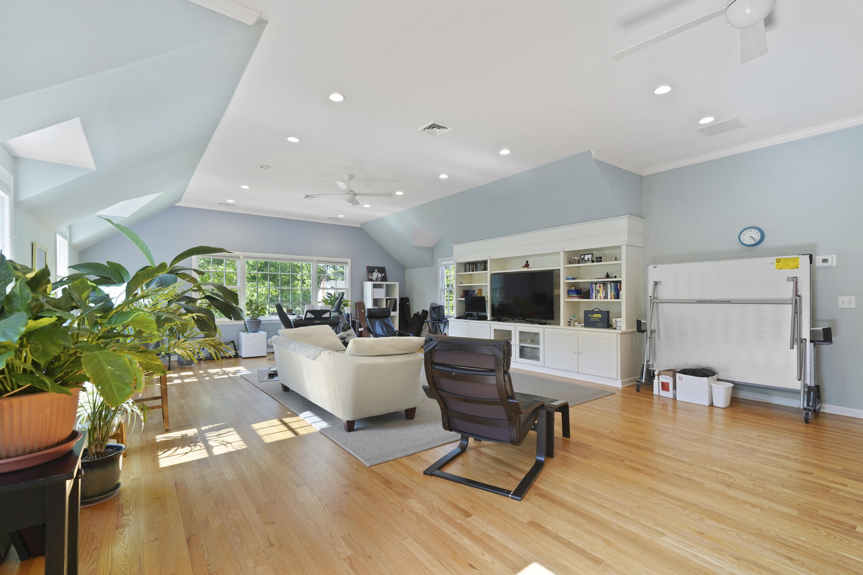 34 Summit Ridge Road New Canaan, CT 06840 - Photo 12 of 28 a living room with furniture and a flat screen tv