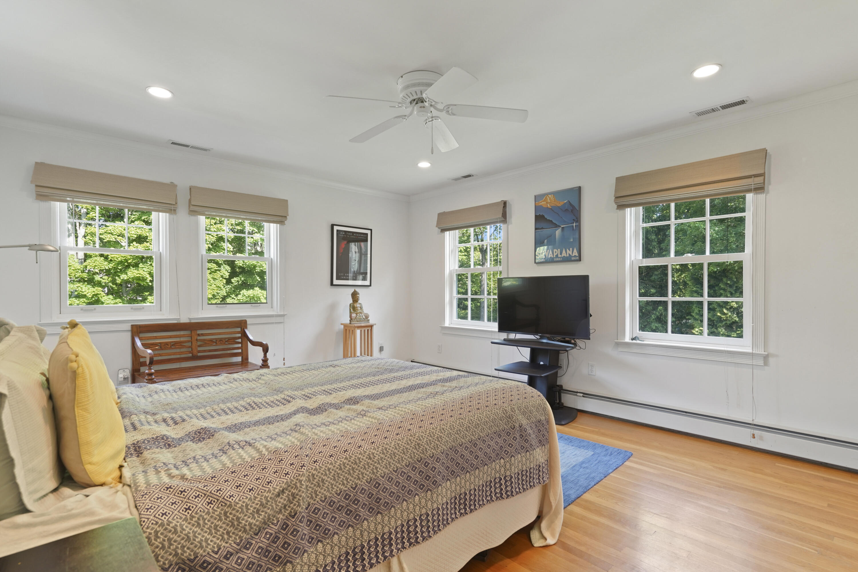 34 Summit Ridge Road New Canaan, CT 06840 - Photo 13 of 28 a bedroom with a bed window and table