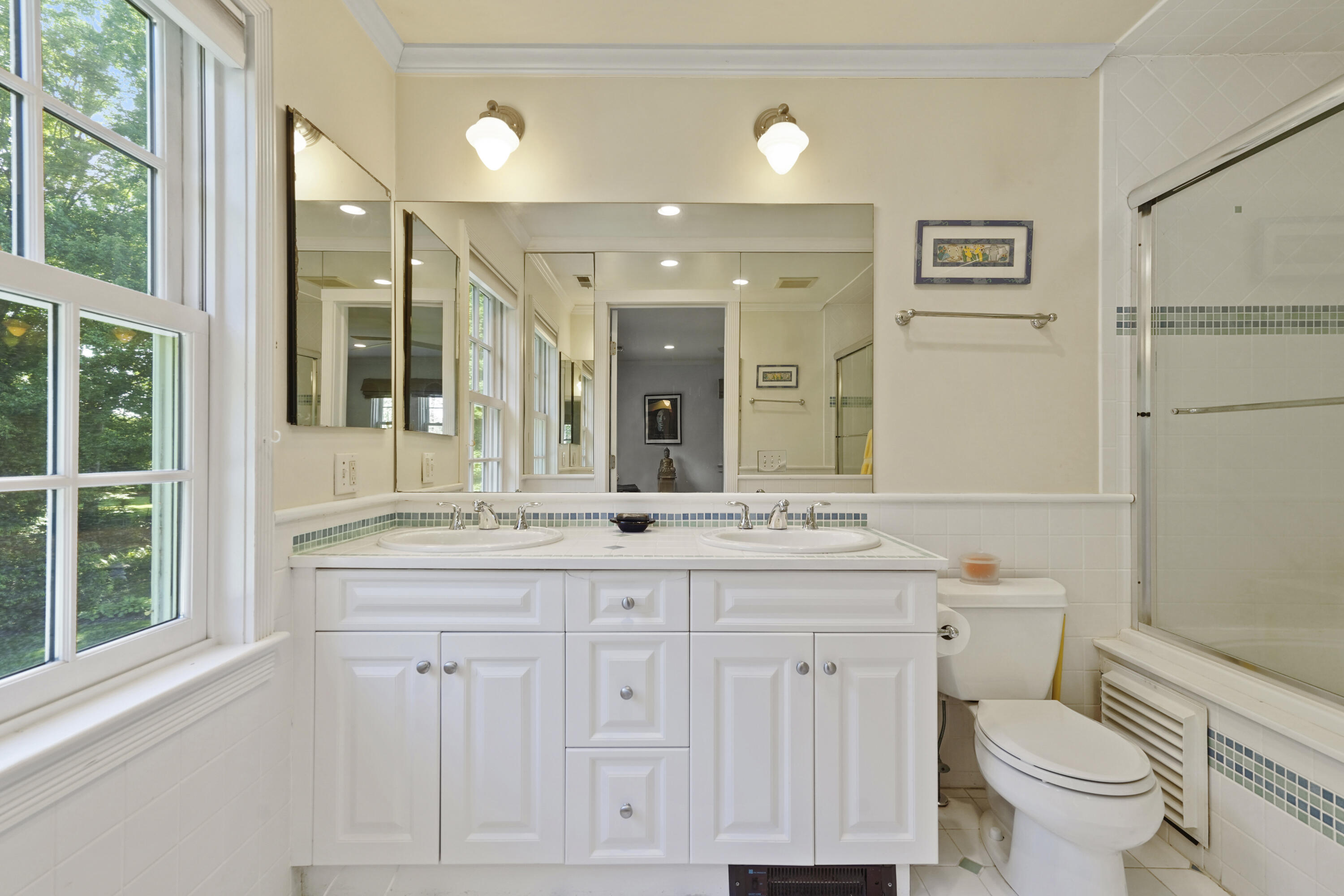 34 Summit Ridge Road New Canaan, CT 06840 - Photo 15 of 28 a bathroom with a granite countertop toilet sink and mirror