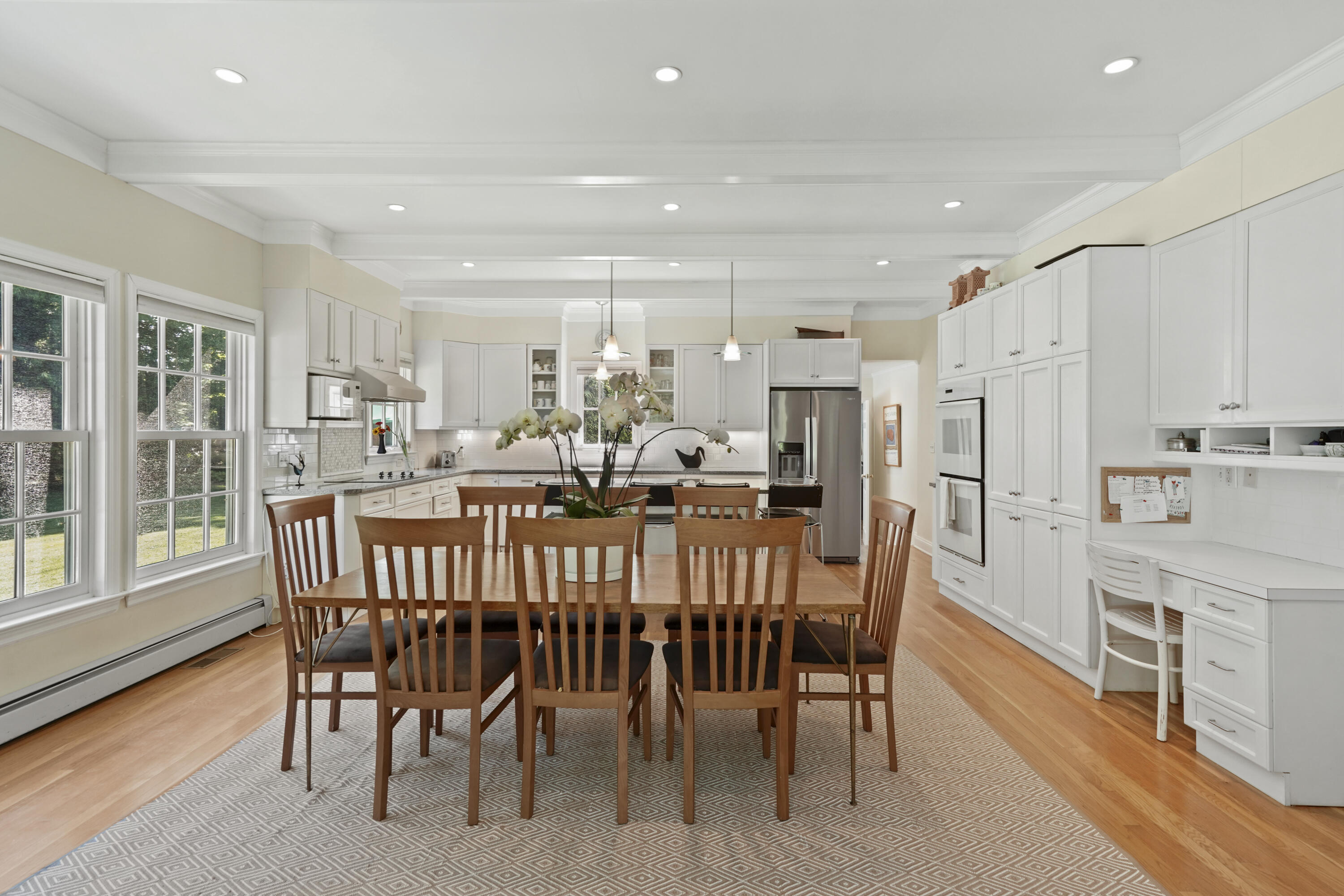 34 Summit Ridge Road New Canaan, CT 06840 - Photo 4 of 28 a view of a dining room with furniture window and wooden floor