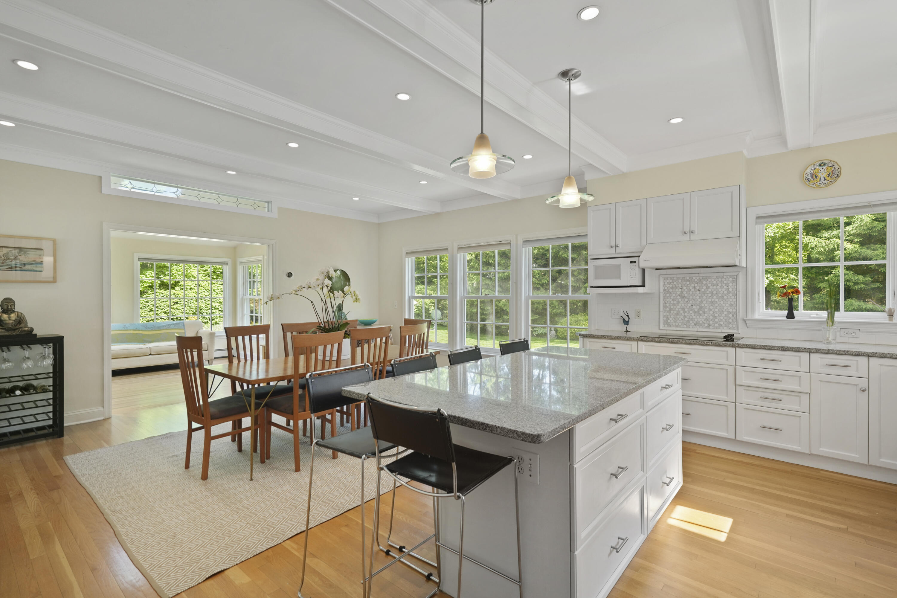 34 Summit Ridge Road New Canaan, CT 06840 - Photo 5 of 28 a large kitchen with kitchen island a large island in it