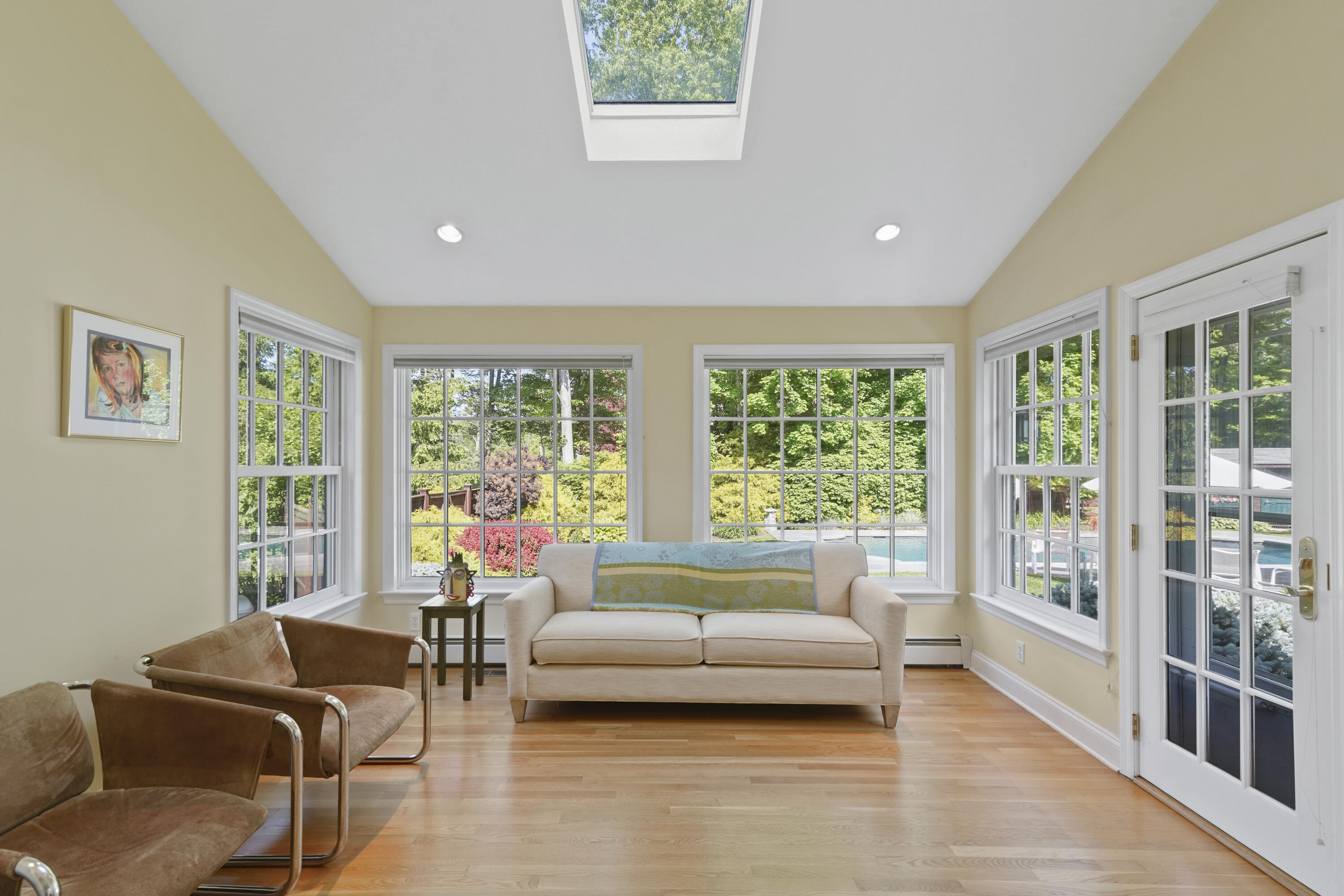 34 Summit Ridge Road New Canaan, CT 06840 - Photo 7 of 28 a living room with furniture and a large window