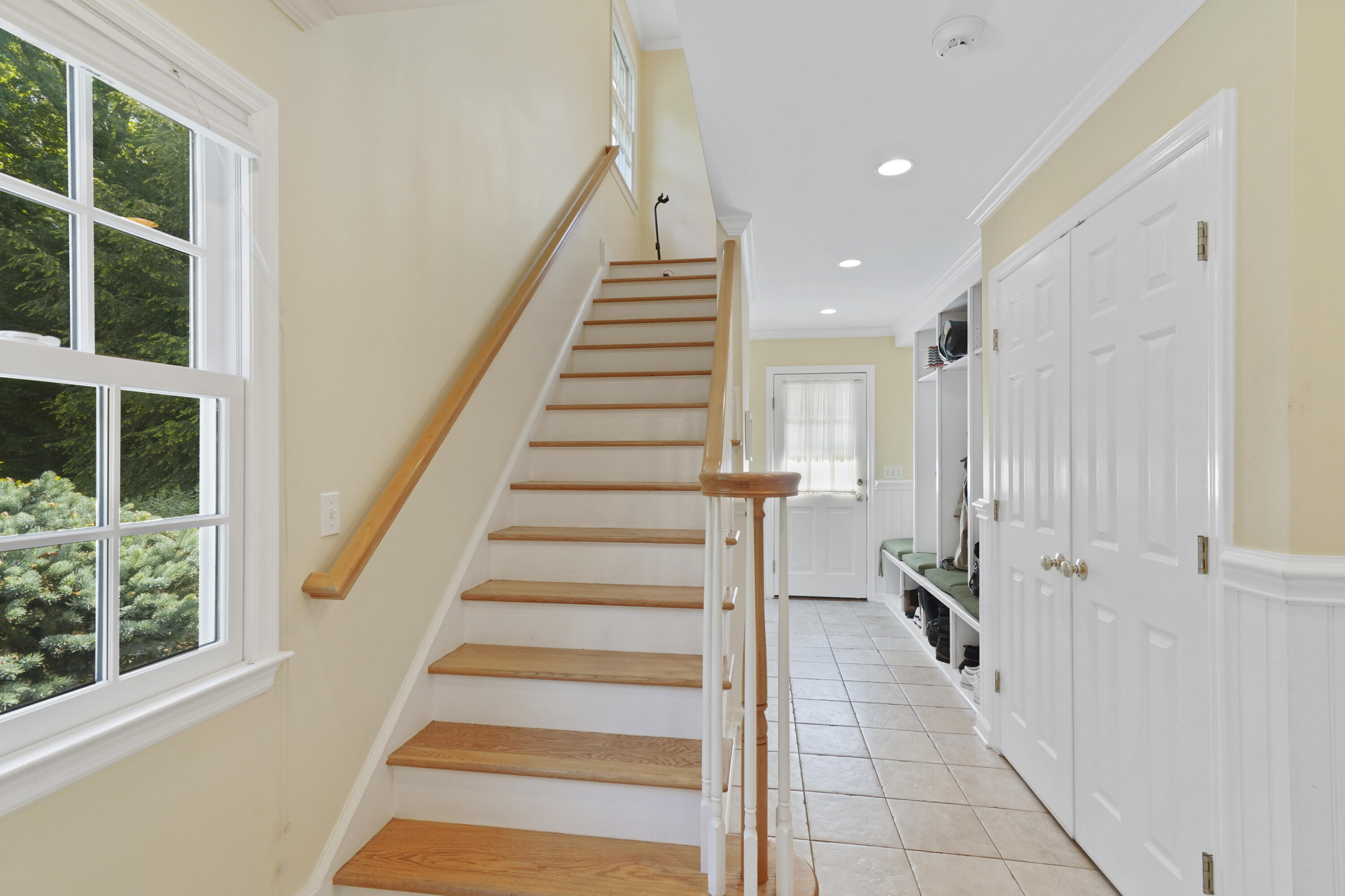 34 Summit Ridge Road New Canaan, CT 06840 - Photo 10 of 28 a view of entryway and hall with wooden floor