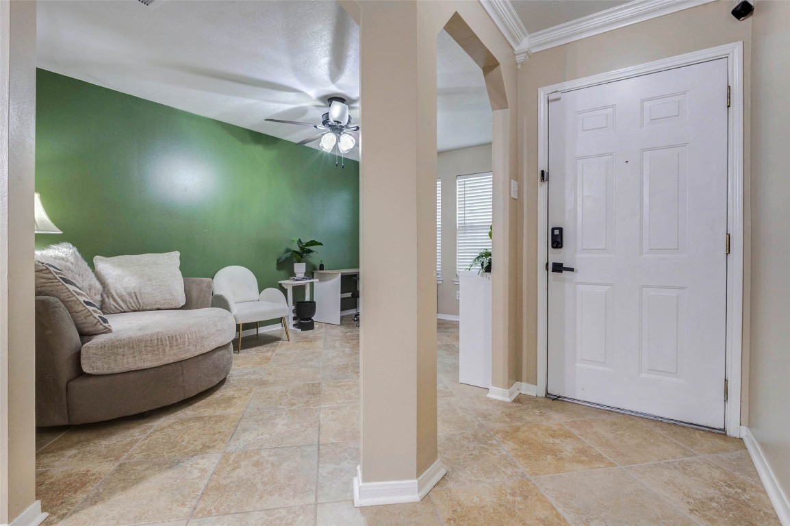 822 Autumn Point Lane Spring, TX 77373 - Photo 4 of 26 Front flex room, currently used as an office. Can be used as playroom or dining area. Accent wall can be painted to match the home if you like.