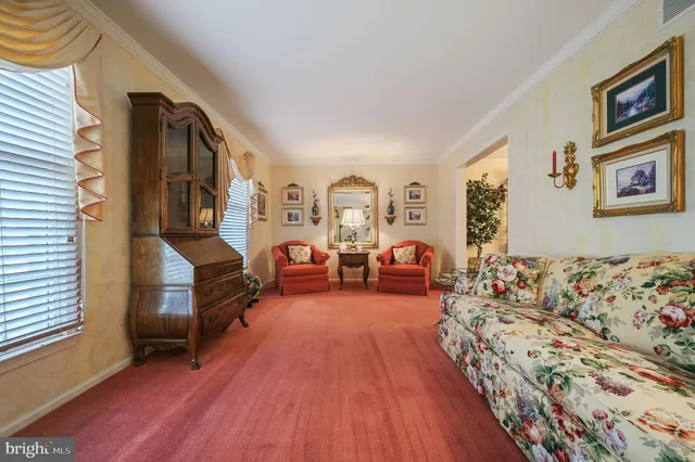 a bed room with furniture and a window