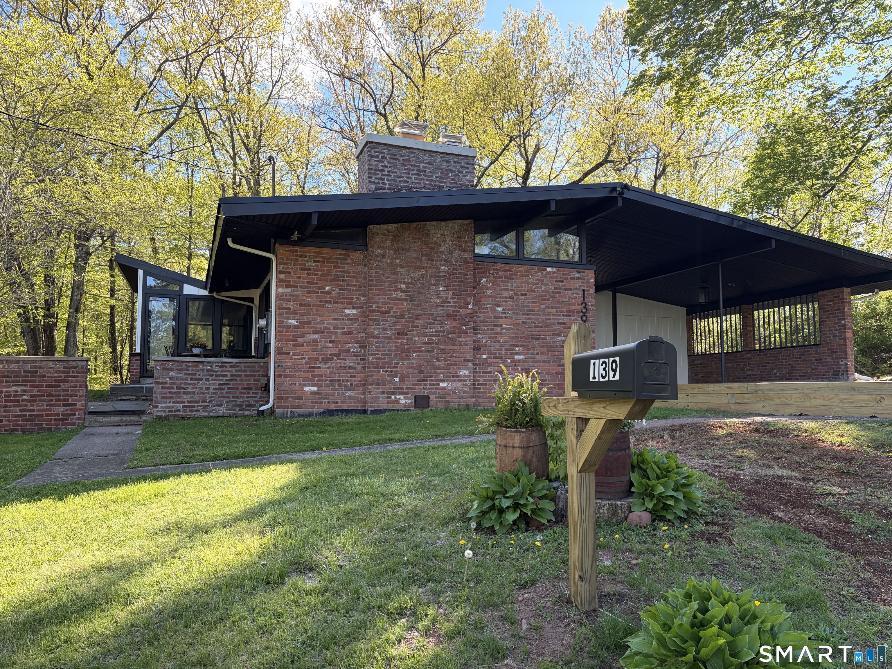 Street view of this mid century modern house