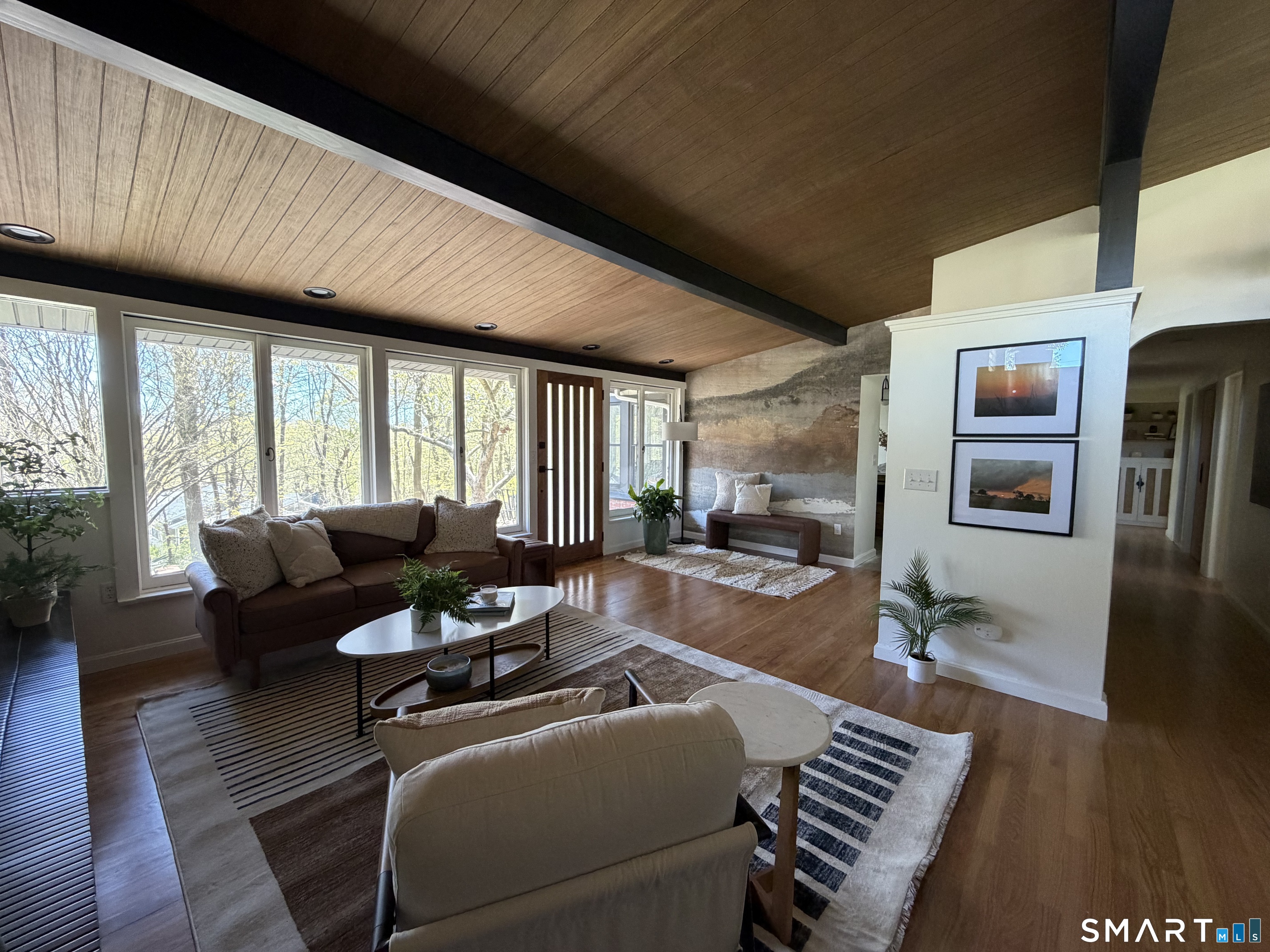 Undisclosed Address Meriden, CT 06451 - Photo 14 of 35 Numerous ways to set up this large L shaped living room with newly refinished hardwood