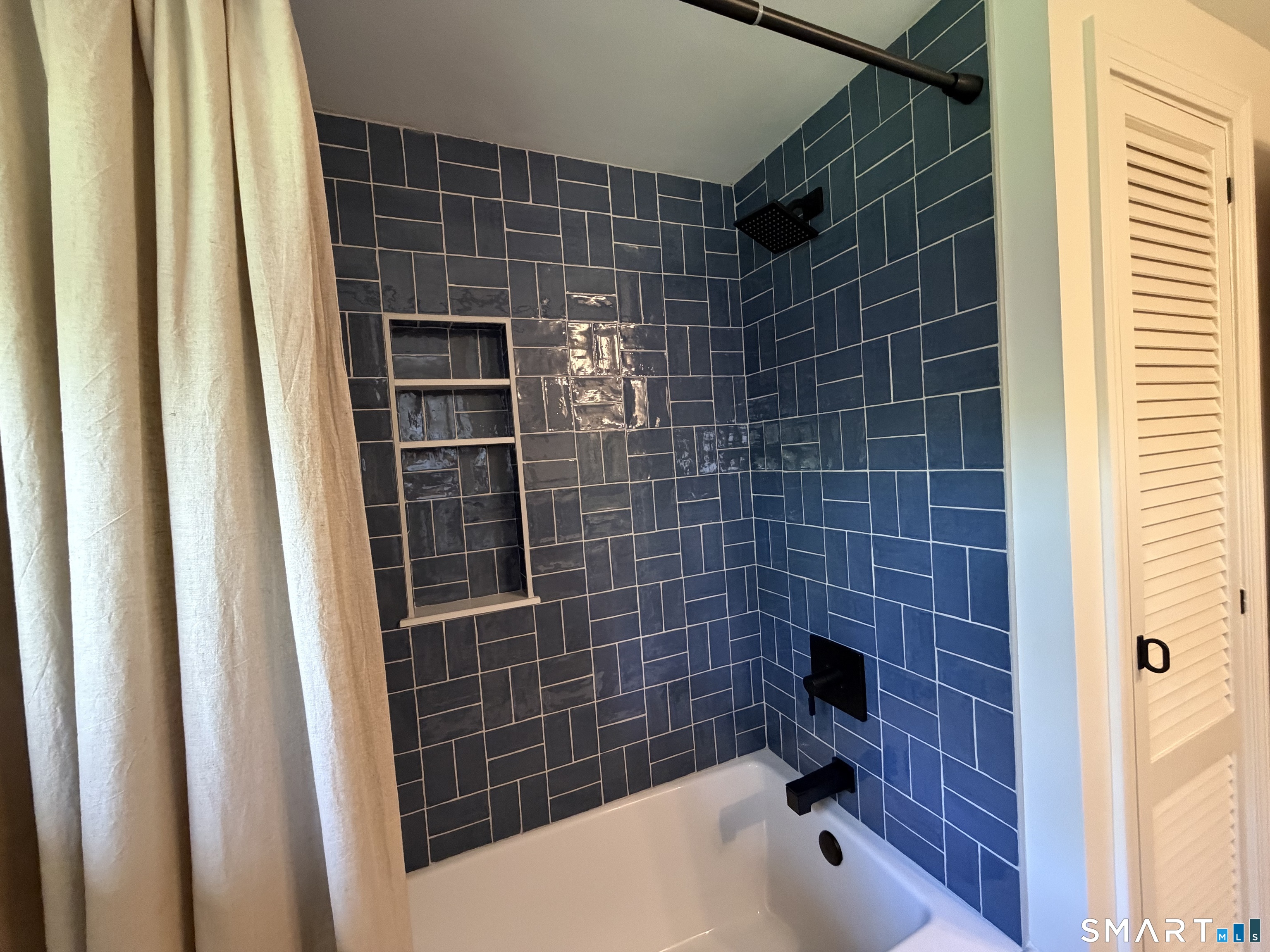 Undisclosed Address Meriden, CT 06451 - Photo 28 of 35 Totally new tiled tub with niche and shower