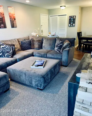 a living room with furniture and a couch