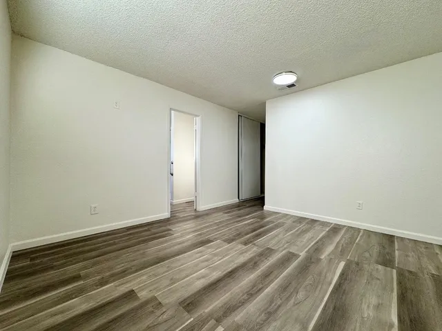 a view of an empty room and window