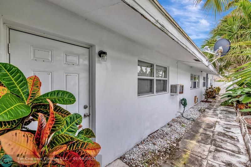 4548 North Ocean Drive, Unit 4 Lauderdale-by-the-Sea, FL 33308 - Photo 11 of 48 a front view of a house with garden
