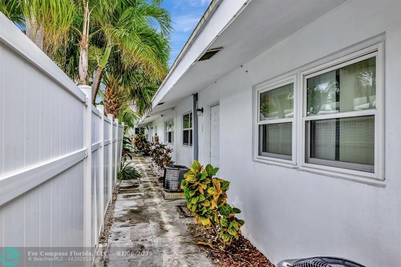 4548 North Ocean Drive, Unit 4 Lauderdale-by-the-Sea, FL 33308 - Photo 14 of 48 a view of a porch with a potted plant