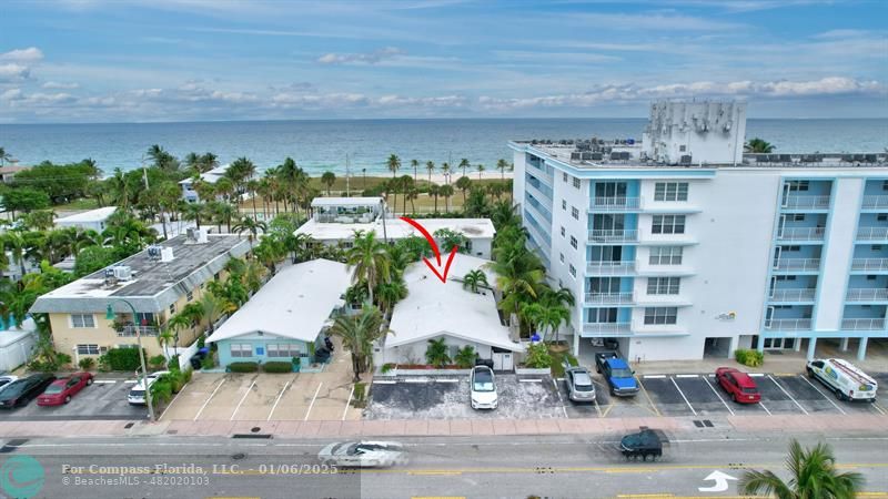 4548 North Ocean Drive, Unit 4 Lauderdale-by-the-Sea, FL 33308 - Photo 16 of 48 a view of building with an outdoor space and seating area