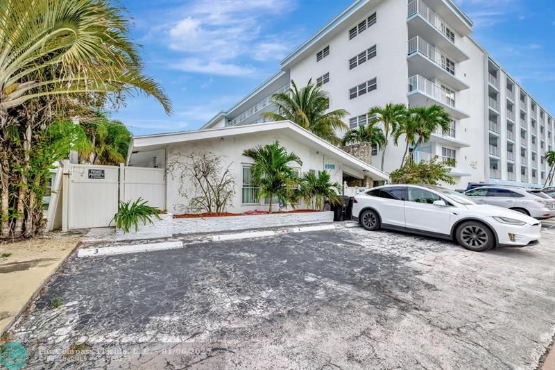 4548 North Ocean Drive, Unit 4 Lauderdale-by-the-Sea, FL 33308 - Photo 2 of 48 a view of a car parked in front of a building