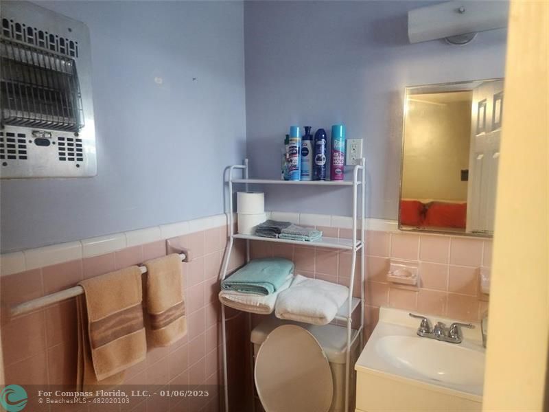 4548 North Ocean Drive, Unit 4 Lauderdale-by-the-Sea, FL 33308 - Photo 44 of 48 a room with storage and utility